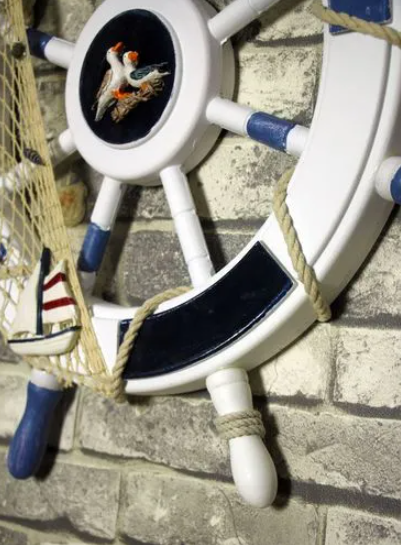 Ý nghĩa phong thủy bánh lái thuyền giúp con người đi đến Chân lý một cách lý trí- phuctuonggold-com